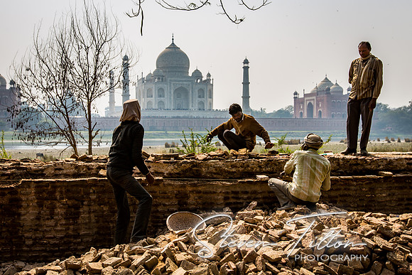 Building up the wall along the Yamuna River across from The Taj Mahal