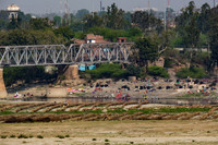 Washing and bathing in the Yamuna River near Agra Fort.