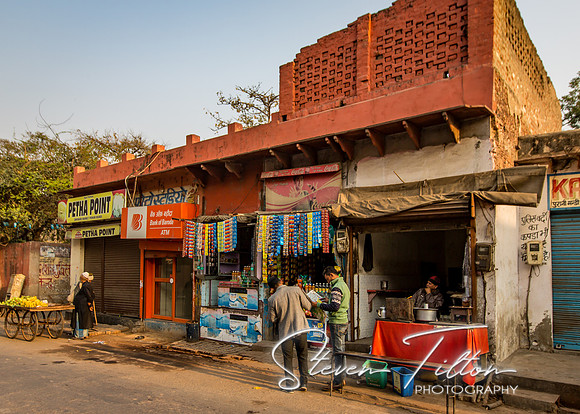 Local merchants setting up shop for morning traffic.