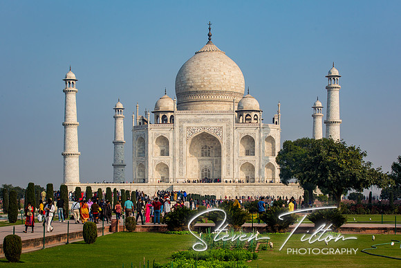 Tourists flock to The Taj Mahal early morning.